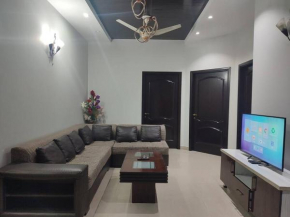 2BR Serviced First Floor Near Expo Center ,Emporium Mall Lahore